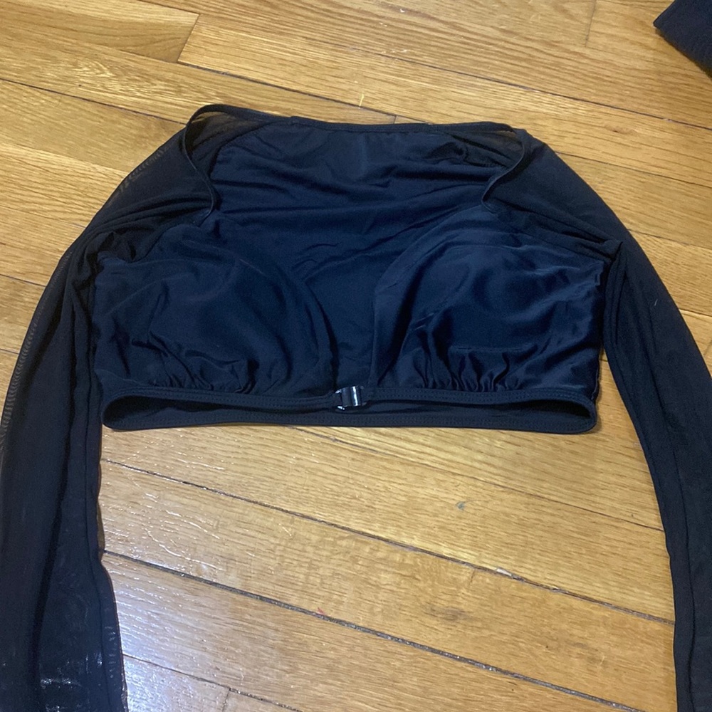 Long sleeve mesh bikini top. 2nd pic is the pic of it online.